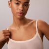 Body minimalista em malha até à coxa Body minimalista em malha até à coxa