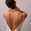 Body minimalista em malha até à coxa Body minimalista em malha até à coxa