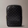 Bolsa com fecho de correr e logótipo em todo o tecido Bolsa com fecho de correr e logótipo em todo o tecido