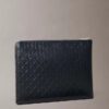 Bolsa com fecho de correr e logótipo em todo o tecido Bolsa com fecho de correr e logótipo em todo o tecido