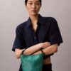 Bolsa tipo balde pequena com logótipo em todo o tecido e bolsa interior Bolsa tipo balde pequena com logótipo em todo o tecido e bolsa interior