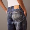 Calças de Denim com estampado