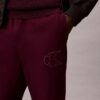 Calças de treino com patch Monogram em malha polar Calças de treino com patch Monogram em malha polar