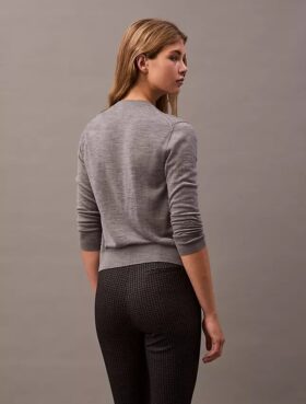 Calças justas com padrão houndstooth em tecido Ponte