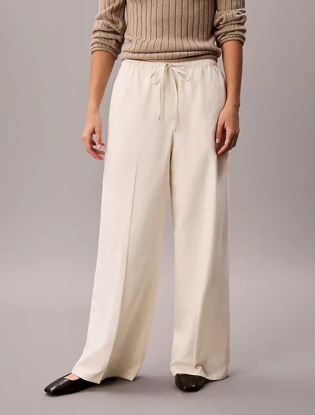 Calças largas com cordão em mistura de linho Calças largas com cordão em mistura de linho