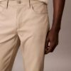 Calças Slim Move de 5 bolsos