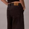 Calções de Denim com bainha enrolada e corte em A Calções de Denim com bainha enrolada e corte em A