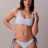 Calção de Bikini com monograma gráfico e atilhos laterais Calção de Bikini com monograma gráfico e atilhos laterais