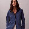 Camisa com botões e bordado inglês Camisa com botões e bordado inglês