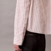 Camisa curta de corte largo com riscas e botões Camisa curta de corte largo com riscas e botões