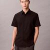 Camisa de algodão elástico com botões e corte justo Camisa de algodão elástico com botões e corte justo