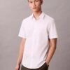 Camisa de algodão elástico com botões e corte justo Camisa de algodão elástico com botões e corte justo