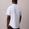 Camisa de algodão elástico com riscas finas e botões Camisa de algodão elástico com riscas finas e botões