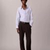 Camisa de algodão às riscas com botões e corte descontraído Camisa de algodão às riscas com botões e corte descontraído