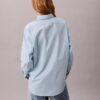 Camisa de algodão às riscas com botões e corte descontraído Camisa de algodão às riscas com botões e corte descontraído