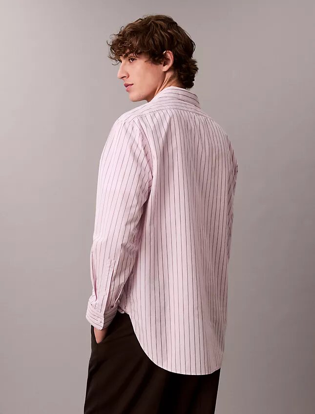Camisa de algodão às riscas com botões e corte descontraído Camisa de algodão às riscas com botões e corte descontraído
