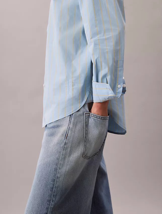 Camisa de algodão às riscas com botões e corte descontraído Camisa de algodão às riscas com botões e corte descontraído