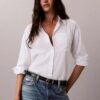 Camisa de botões com aba enrolada em Lyocell Camisa de botões com aba enrolada em Lyocell