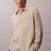 Camisa de botões com corte descontraído, em tecido frisado com riscas tingidas no fio Camisa de botões com corte descontraído, em tecido frisado com riscas tingidas no fio