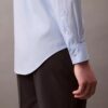 Camisa de botões com corte justo e elástico Camisa de botões com corte justo e elástico