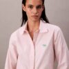 Camisa de botões com riscas e corte descontraído Camisa de botões com riscas e corte descontraído