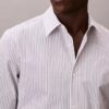 Camisa de botões, justa e elástica, com riscas Camisa de botões, justa e elástica, com riscas