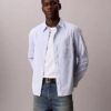 Camisa de botões listrada, justa e descontraída Camisa de botões listrada, justa e descontraída