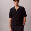 Camisa de malha de algodão com botões Camisa de malha de algodão com botões