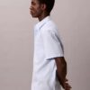 Camisa de manga curta com botões, em Cotton Stretch às riscas