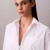 Camisa de popeline com botões e corte descontraído Camisa de popeline com botões e corte descontraído