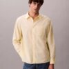 Camisa de popeline lavado com botões e corte descontraído Camisa de popeline lavado com botões e corte descontraído