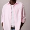 Camisa de popeline lavado com botões e corte descontraído Camisa de popeline lavado com botões e corte descontraído