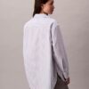 Camisa de popeline às riscas com botões e corte descontraído