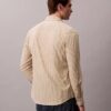 Camisa de riscas, corte justo e elástica, com botões Camisa de riscas, corte justo e elástica, com botões