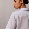 Camisa descontratada com botões em mistura de algodão