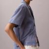 Camisa descontratada com botões em mistura de algodão Camisa descontratada com botões em mistura de algodão