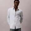 Camisa Oxford com botões e logótipo gráfico desbotado Camisa Oxford com botões e logótipo gráfico desbotado