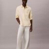 Camisa Oxford com botões e logótipo gráfico desbotado Camisa Oxford com botões e logótipo gráfico desbotado