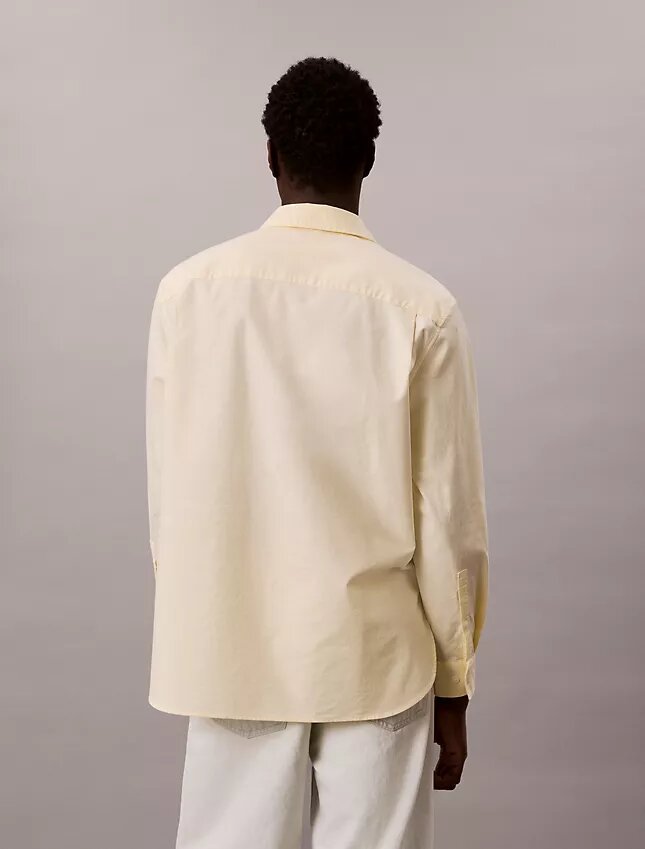Camisa Oxford com botões e logótipo gráfico desbotado Camisa Oxford com botões e logótipo gráfico desbotado