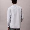 Camisa Oxford com botões e logótipo gráfico desbotado Camisa Oxford com botões e logótipo gráfico desbotado