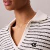 Camisa polo com costura às riscas
