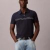 Camisa polo com fecho de correr de um quarto e debrum contrastante