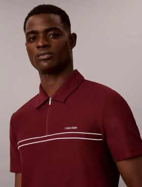 Camisa polo com fecho de correr de um quarto e debrum contrastante