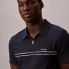 Camisa polo com fecho de correr de um quarto e debrum contrastante
