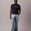 Camisa polo com fecho de correr de um quarto e debrum contrastante