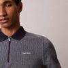Camisa polo com fecho em espinha