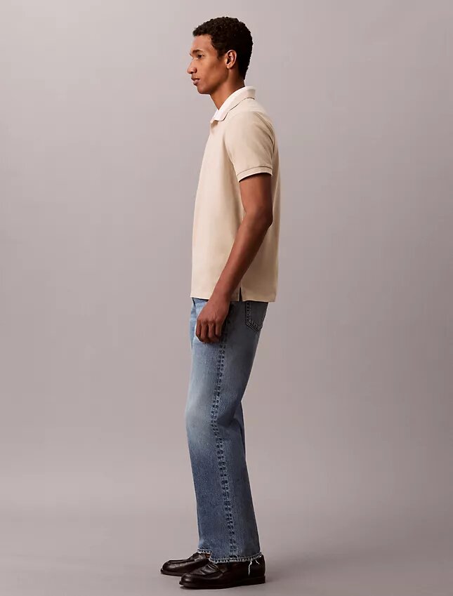 Camisa polo com gola em blocos de cor em piqué Camisa polo com gola em blocos de cor em piqué