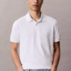 Camisa polo com gola em blocos de cor em piqué Camisa polo com gola em blocos de cor em piqué