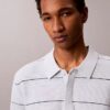 Camisa polo de malha às riscas em algodão Camisa polo de malha às riscas em algodão