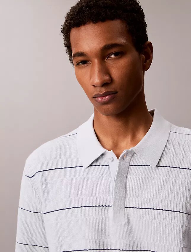 Camisa polo de malha às riscas em algodão Camisa polo de malha às riscas em algodão